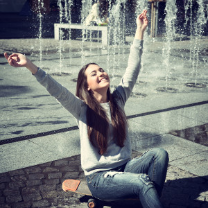 Beautiful excited teen girl pleased youth and sunny spring day s
